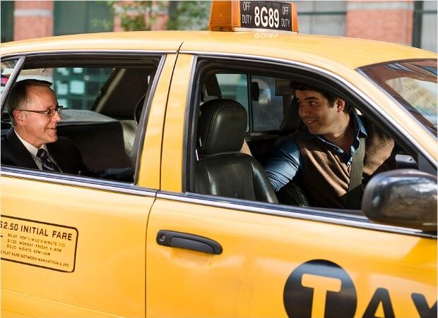 Business man talking with taxi driver